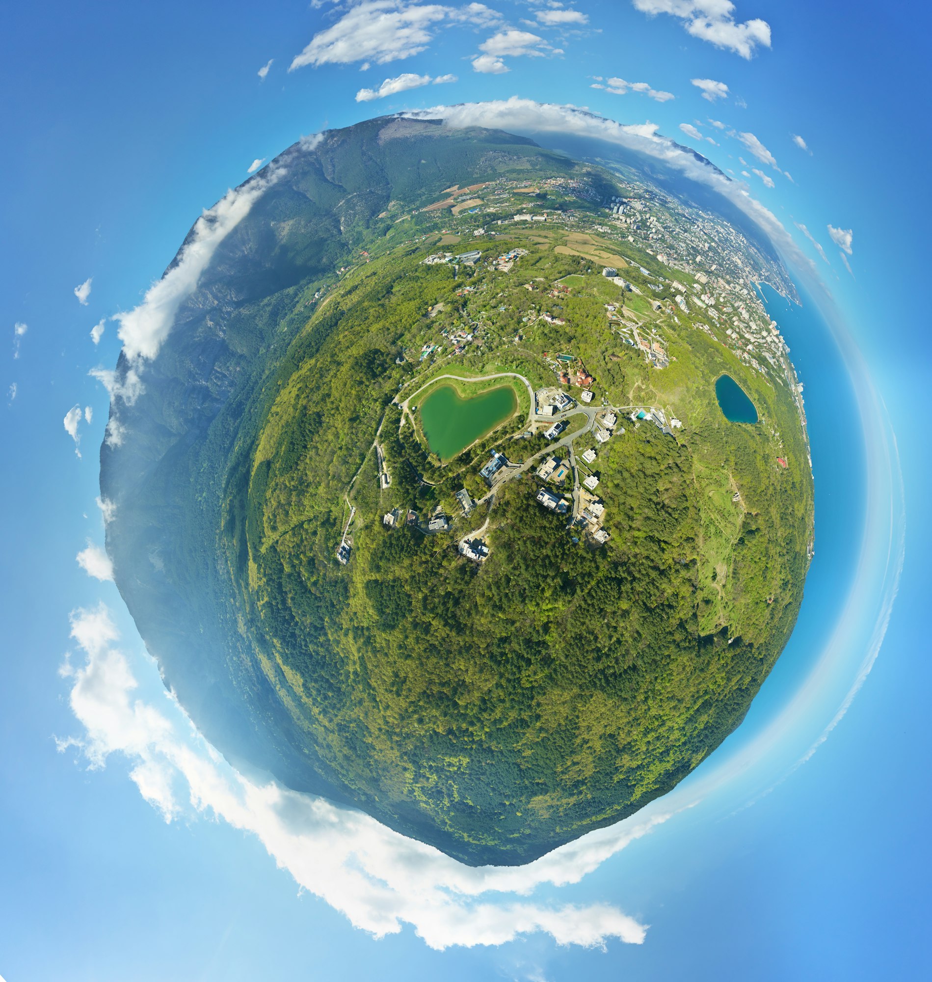 Little planet panorama of spring mountain forest, and magabi lake in form of herat